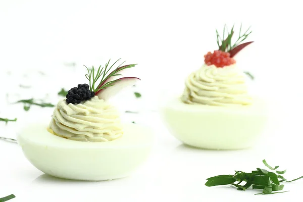 Canapes with egg and caviar — Stock Photo, Image