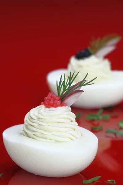 Canapes with egg and caviar — Stock Photo, Image