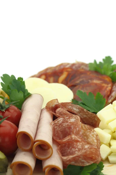 Meat delicatessen plate with cheese — Stock Photo, Image