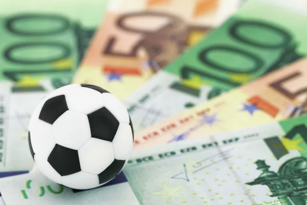 Fútbol y dinero —  Fotos de Stock