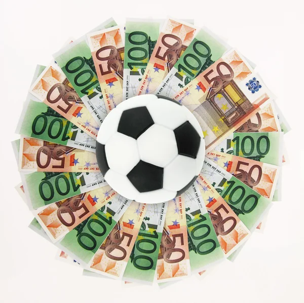 Futebol e dinheiro — Fotografia de Stock