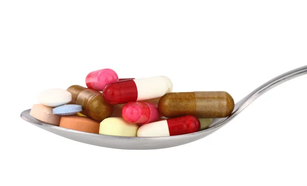 Tabletki na łyżkę — Zdjęcie stockowe