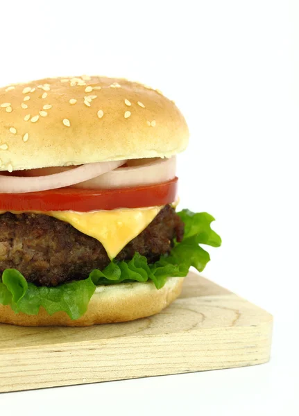 Delicious grilled burger on wheat buns — Stock Photo, Image