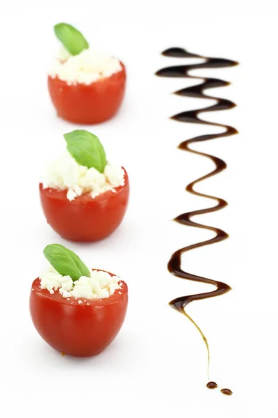 Cherry tomatoes stuffed with white cheese — Zdjęcie stockowe