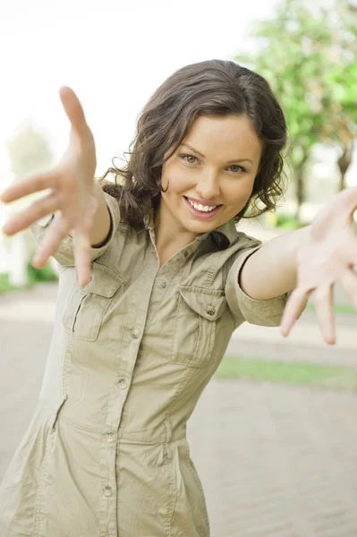 Portrait of beautiful young woman having good time outdoors — Stock Photo, Image