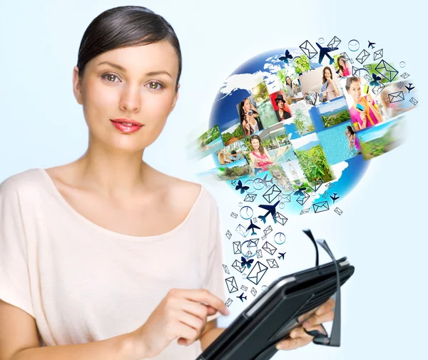 Young pretty woman using her universal device — Stock Photo, Image