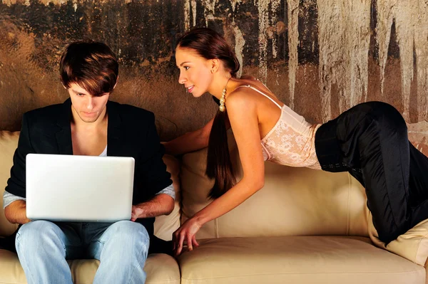 Fashion style photo of an attractive young couple at their grunge apartment at evening — Stock Photo, Image