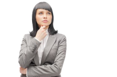 Caucasian business woman thinking in looking pensive and happy i clipart