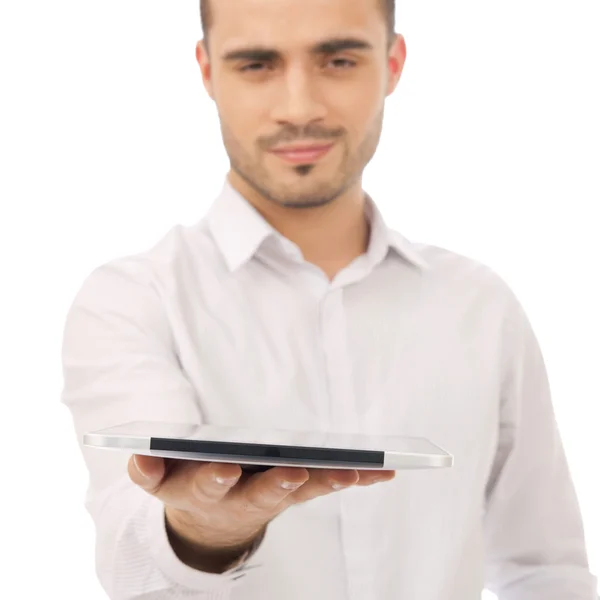 Knappe lachende man met tablet pc. geïsoleerd over witte b — Stockfoto
