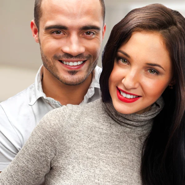 Portrait of young couple standing together at their home. Mortga — Stock Photo, Image