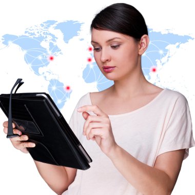 Portrait of young woman standing in fron of big world map and lo clipart