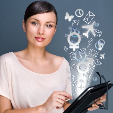 Portrait of pretty young woman holding Touch Screen tablet compu clipart