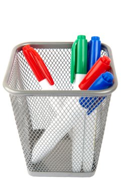 Markers for white board in basket isolated on a white background clipart