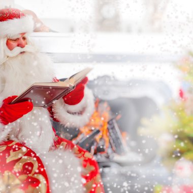 Santa sitting at the Christmas tree, near fireplace and reading clipart