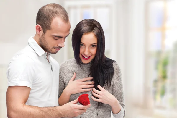 Young man making love proposal to a lady of his choice at their — Stock Photo, Image