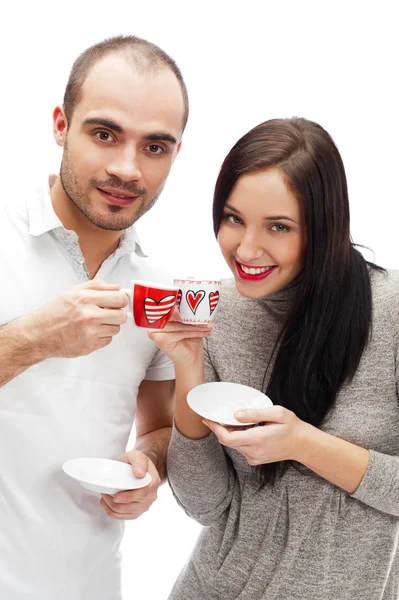 Portrét mladé krásné páru s nápoje káva nebo čaj — Stock fotografie