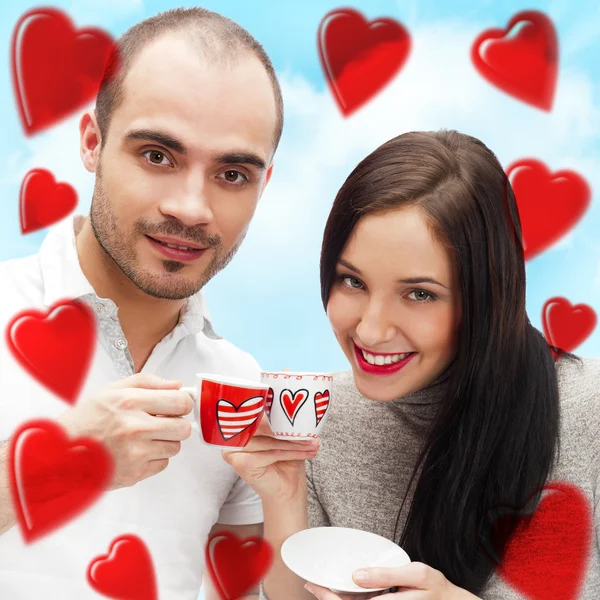 Porträt eines jungen schönen Paares bei Tee oder Kaffee — Stockfoto