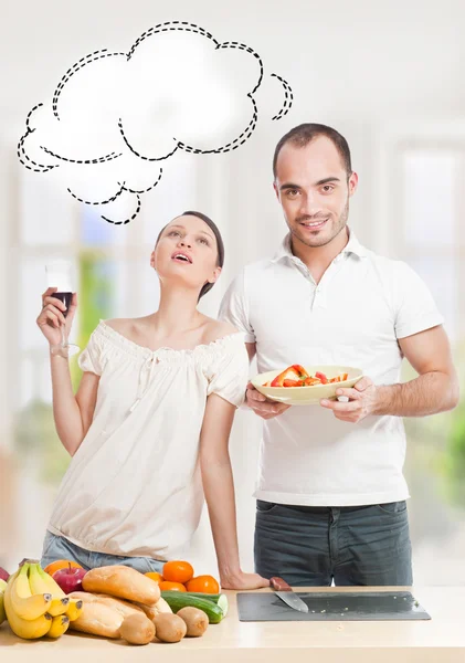 Lovely romantic couple in casuals enjoying a goodtime in kitchen — Stock Photo, Image