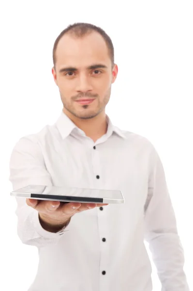 Muž vzrušený, držení počítače tablet pc izolovaných na bílém pozadí. Chee — Stock fotografie