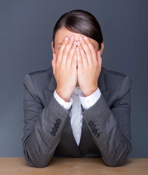 Portrait of tired business woman with face palm — Stock Photo, Image