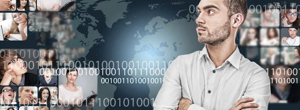 A handsome business man against world map on background with man — Stock Photo, Image
