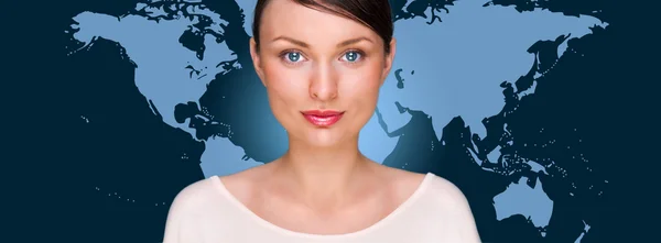 Portrait of young pretty woman looking at camera with map on bac — Stock Photo, Image