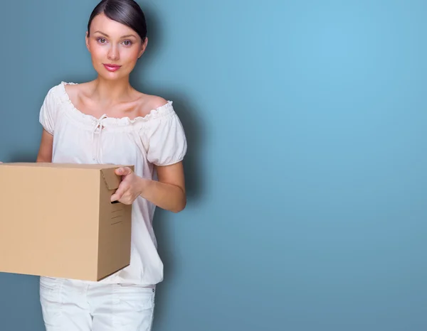 Closeup portrait of a young woman with box — Stock Photo, Image
