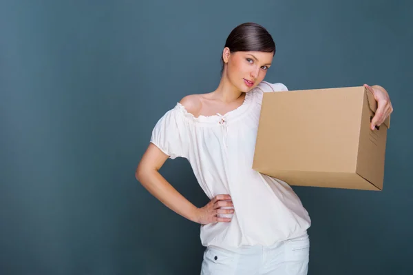 Closeup portrait of a young woman with box — Stock Photo, Image