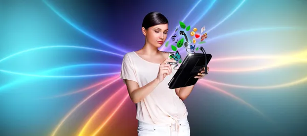 Young pretty woman using her universal device — Stock Photo, Image