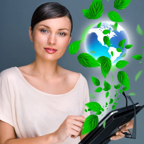 Portrait of young woman standing indoors at her office and worki — Stock Photo, Image