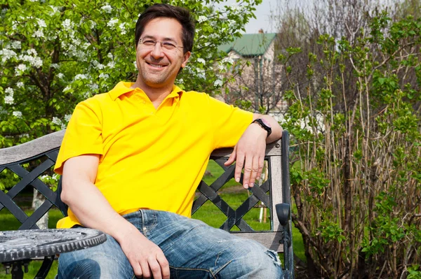 Middle Aged Man Relaxing In Garden — Stock Photo, Image