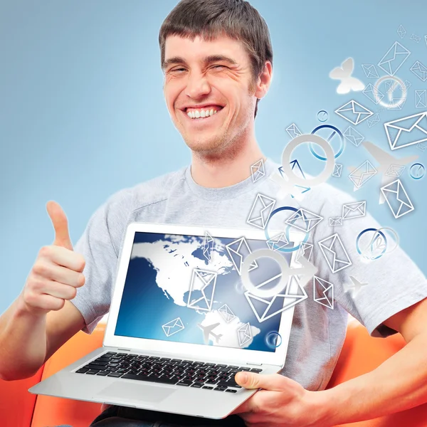 Closeup of a young smiling business man sitting at his home offi — Stock Photo, Image