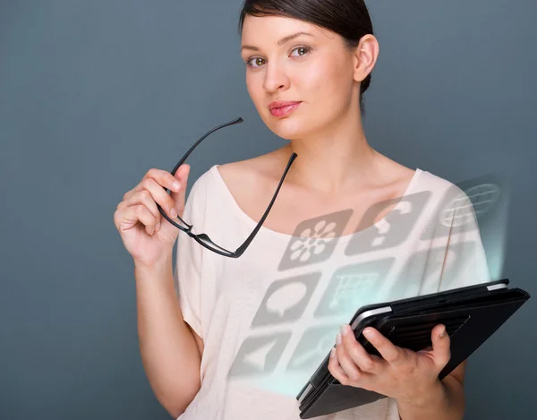 Portrait of young pretty woman holding tablet computer and glass — Stock Photo, Image