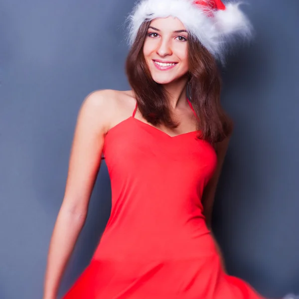 20-25 jaar od mooie vrouw in Kerstmis jurk dansen — Stockfoto