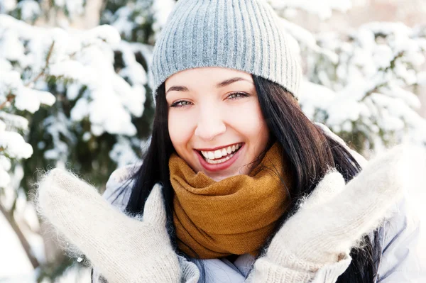 Portrait of young beautiful girl outdoors in winter having fun a Royalty Free Stock Photos