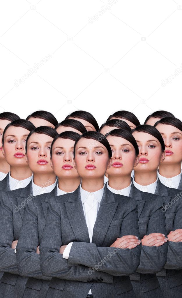 Many identical businesswomen clones. Businesswoman production co