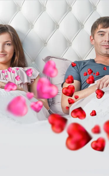 Young couple lying in their bed thinking about something. Red he — Stock Photo, Image