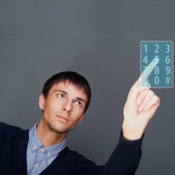 Portret van volwassen bedrijf man op een touchscreen knop whi te drukken — Stockfoto