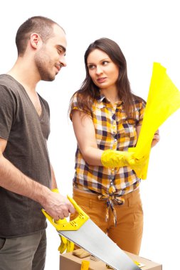 Couple preparing for renovation of their home clipart