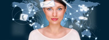 A business woman with icons of her affairs floating around her head. Portrait of pretty girl working with her virtual pc looking at camera and smiling. Daily deals online. World map at the back clipart