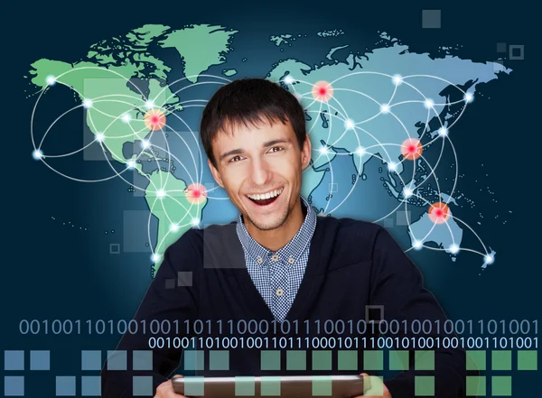 A business man is using the internet. A map of the Earth with glowing points of locations and lines of connections and technology images in the background — Stock Photo, Image