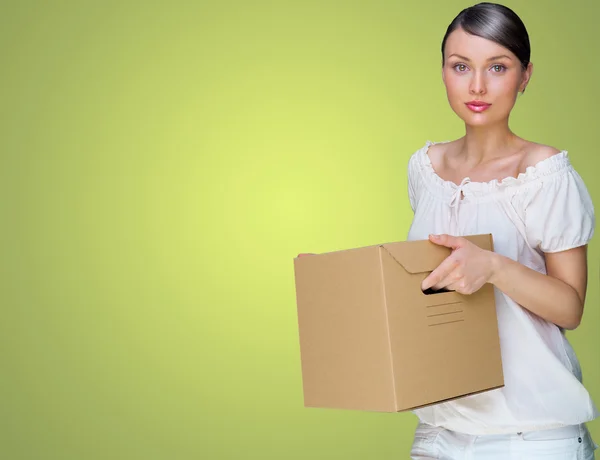 Close-up portrait of a young woman with box — Stock Photo, Image