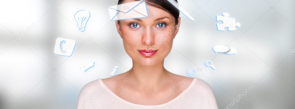 A business woman with icons of her affairs floating around her head. Portrait of pretty woman working with her virtual pc looking at camera and smiling. Daily deals online. Working at office