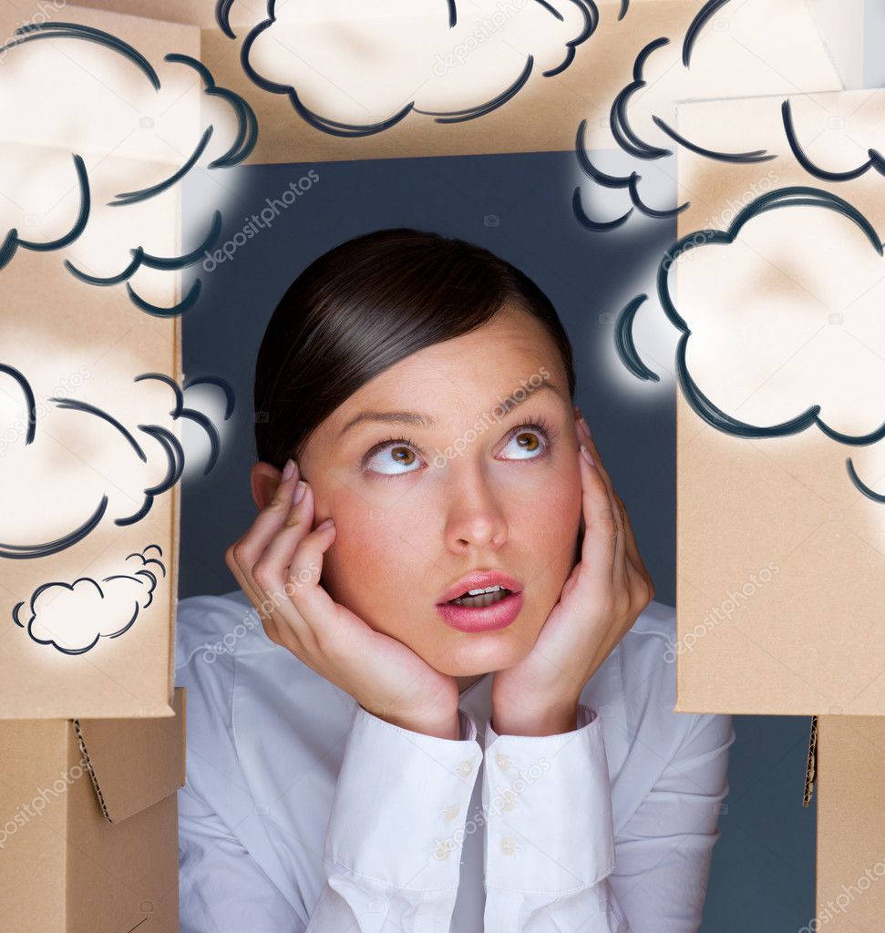 Portrait of young woman surrounded by lots of boxes. Lots of work concept. Help needed. Blank cloud balloons overhead