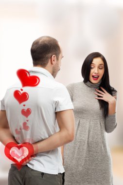 Portrait of a happy adult man gifting to his wife a ring to surprise her on their date clipart