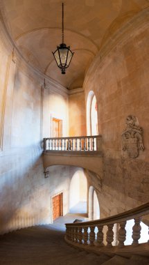 Charles V palace stairs and hall. Vertical panorama clipart
