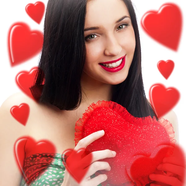 Young pretty attractive smiling woman with with soft heart toy. Holding Love Symbol and smiling — Stock Photo, Image