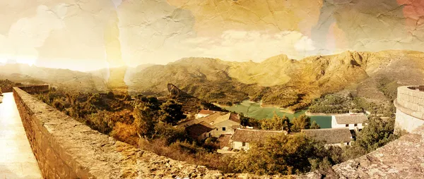 Panoramic view of beautiful mountains and lofty lake. Guadalest, Spain. Old photo style — Stock Photo, Image