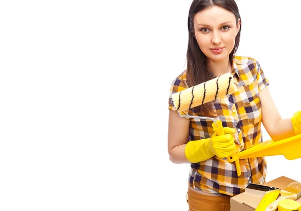 Young woman renovating her new home — Stock Photo, Image