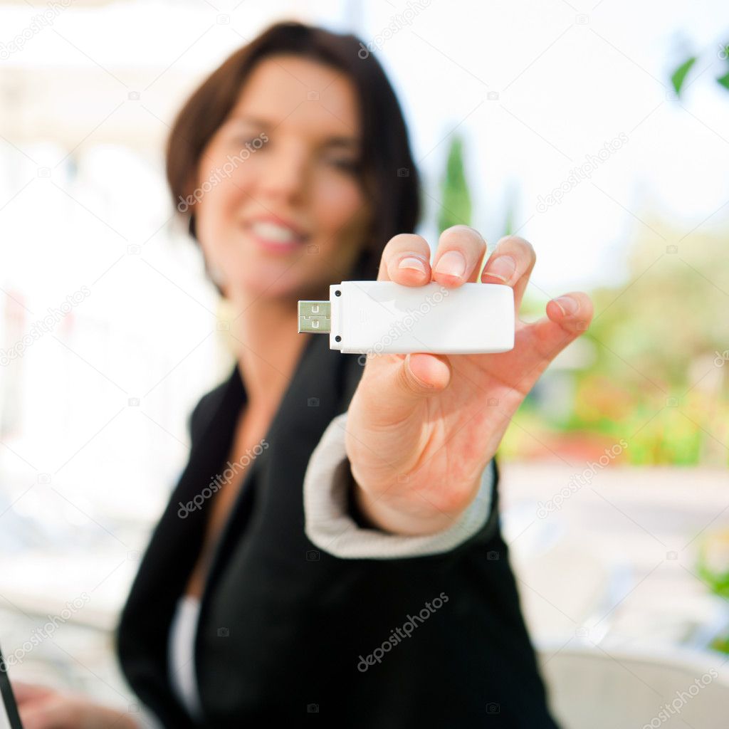 Young business woman using wireless internet connection with 3g